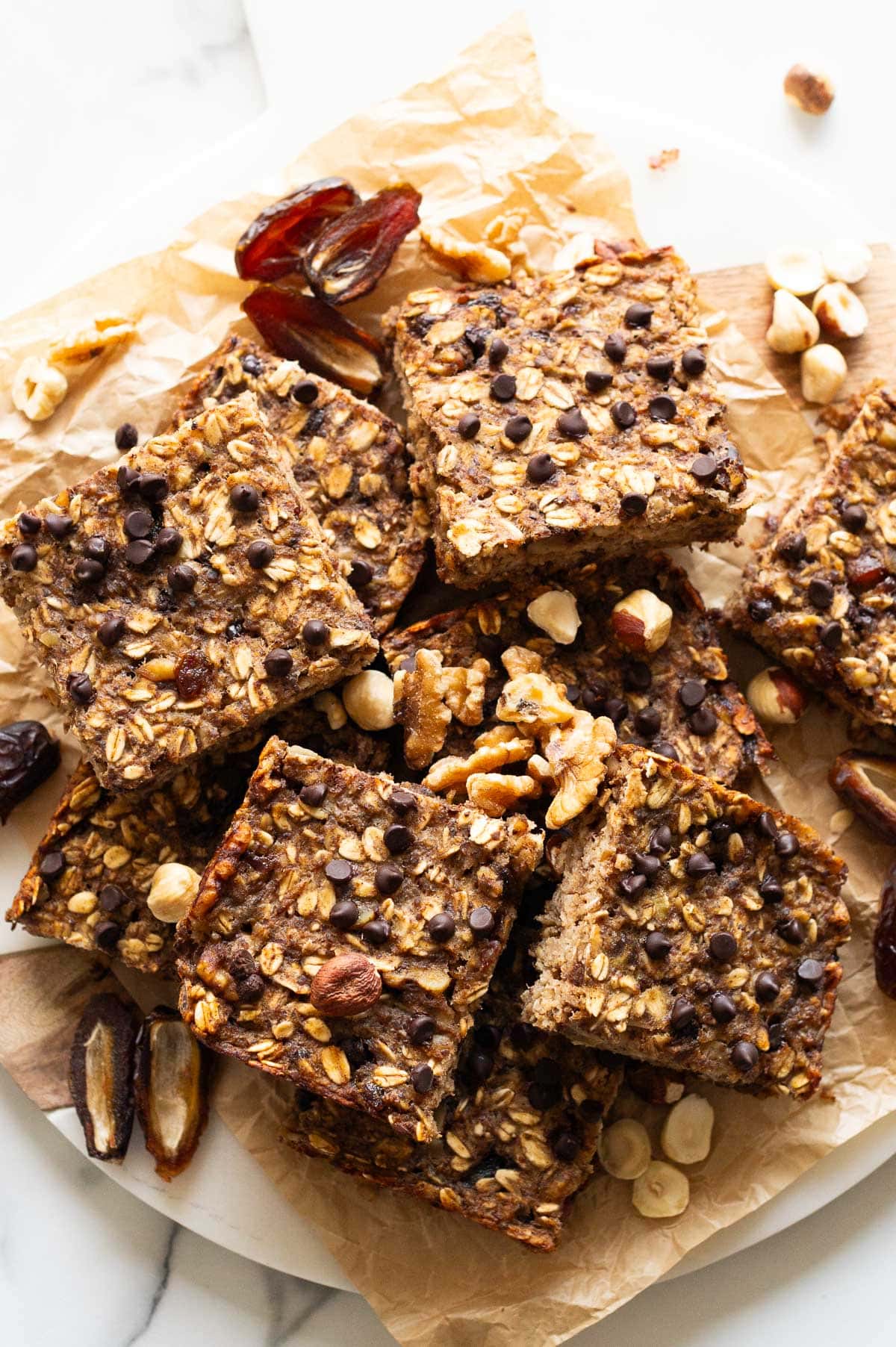 Healthy oatmeal bars with chocolate chips on a serving platter.