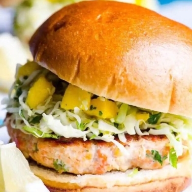 Healthy salmon burgers on a bun.