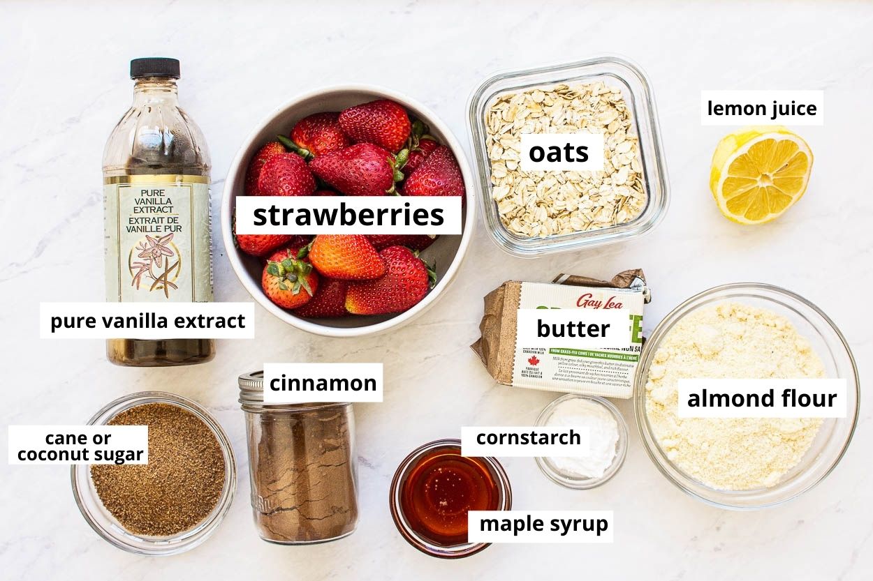 Strawberries, oats, almond flour, butter, sugar, maple syrup, vanilla, cornstarch, lemon, cinnamon.