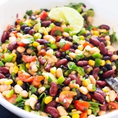 Mexican bean salad with lime in a bowl.