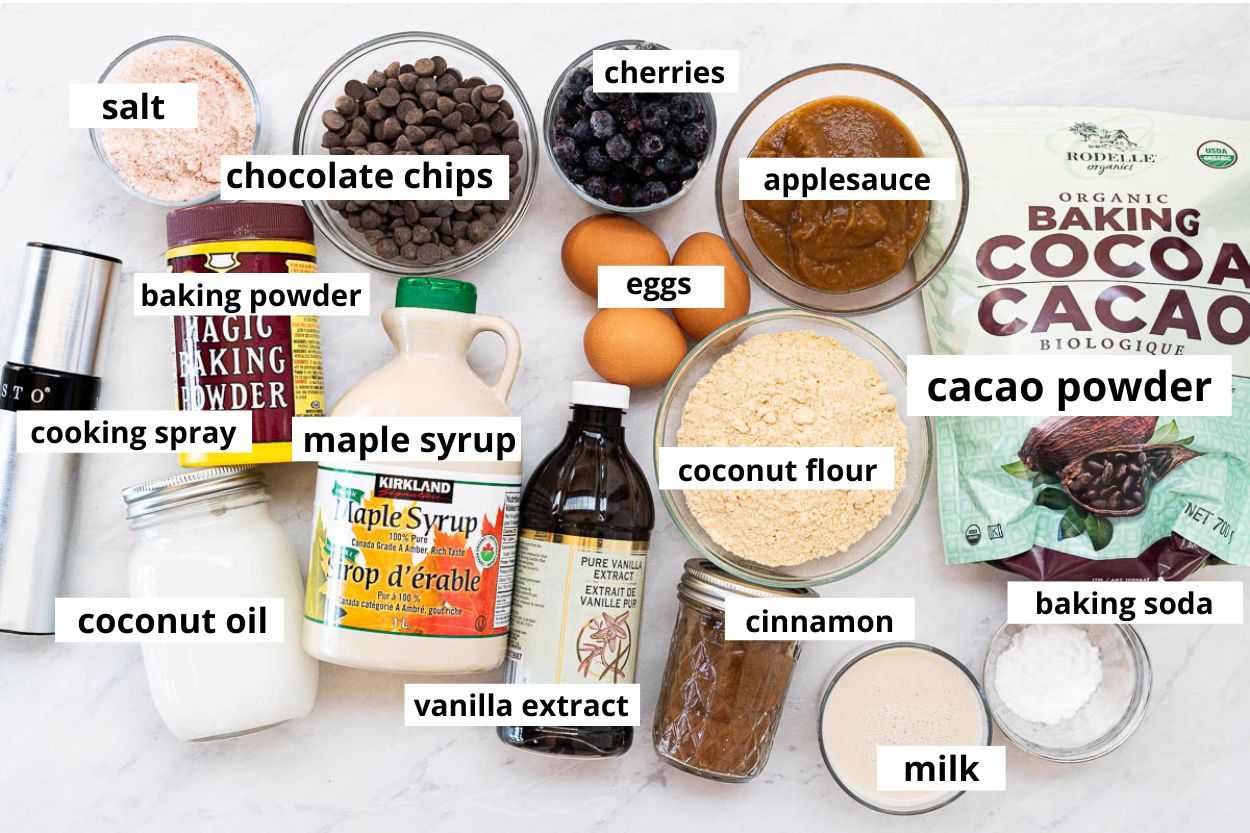 Coconut flour, milk, applesauce, eggs, chocolate chips, cherries, cacao powder, maple syrup, coconut oil, vanilla, cinnamon, baking powder, baking soda, cooking spray, salt.