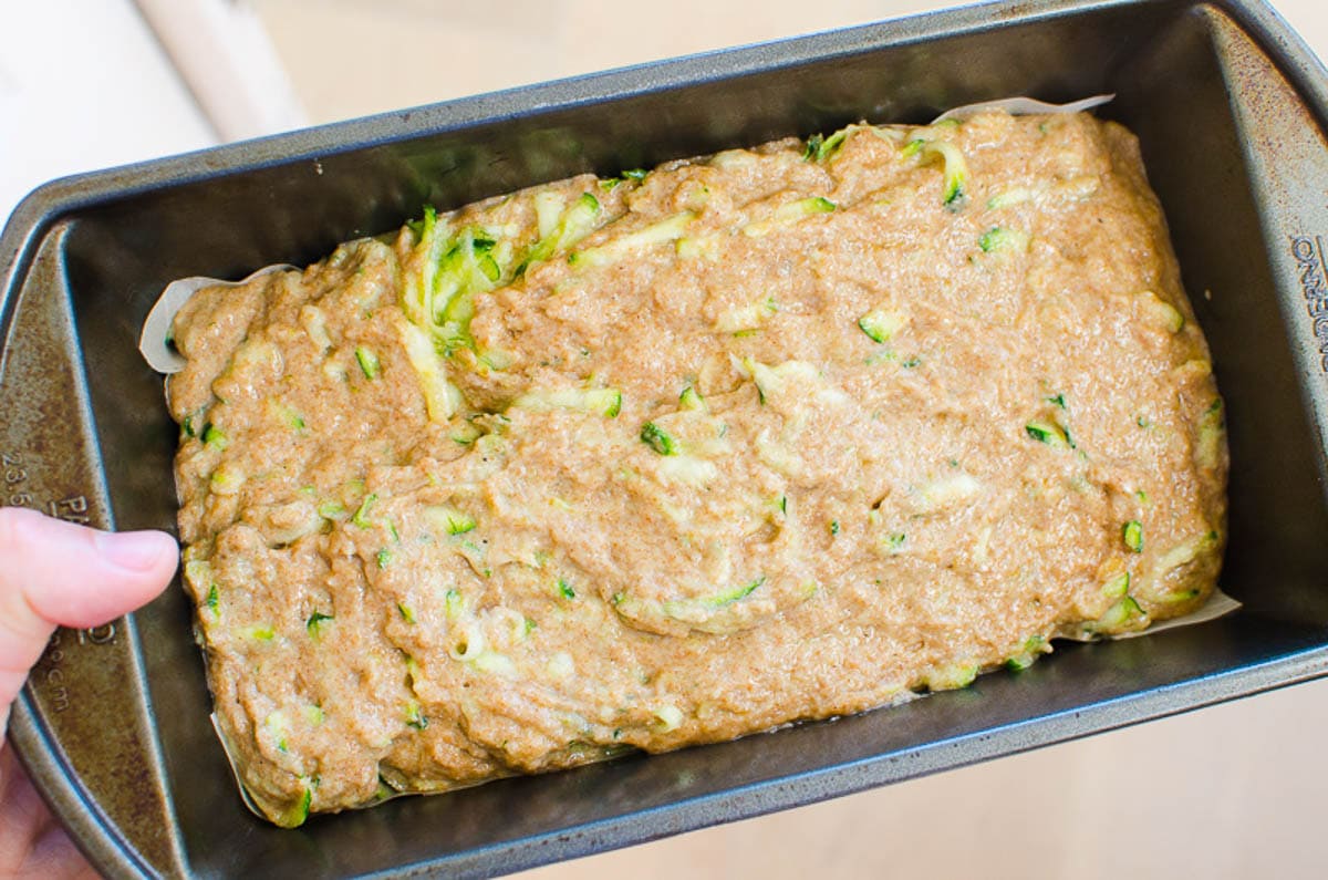 Unbaked zucchini banana bread in loaf pan.