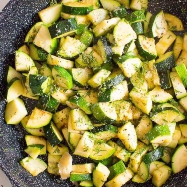 Sauteed Zucchini recipe in a skillet.