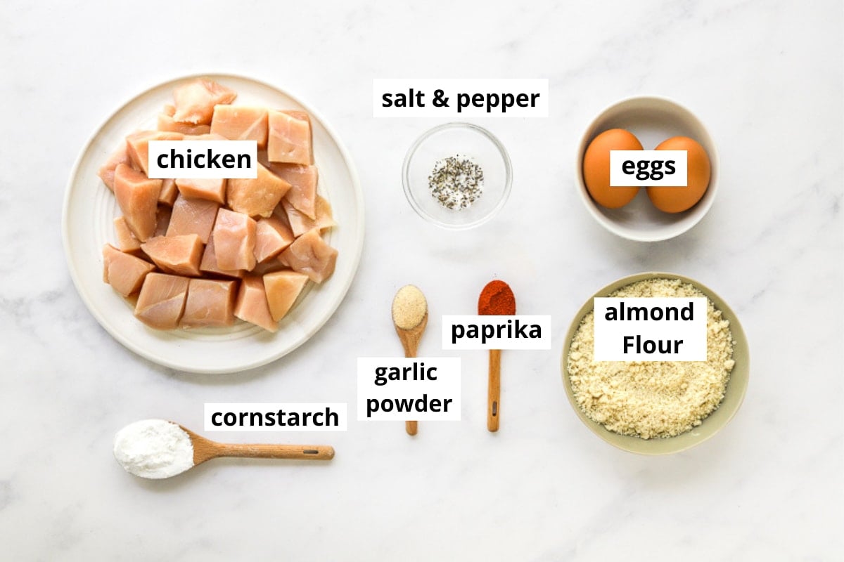 Chicken, eggs, almond flour, cornstarch, garlic powder, paprika, salt and pepper.