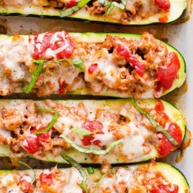 Easy zucchini boats garnished with basil.