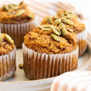 Almond flour pumpkin muffns on a plate.