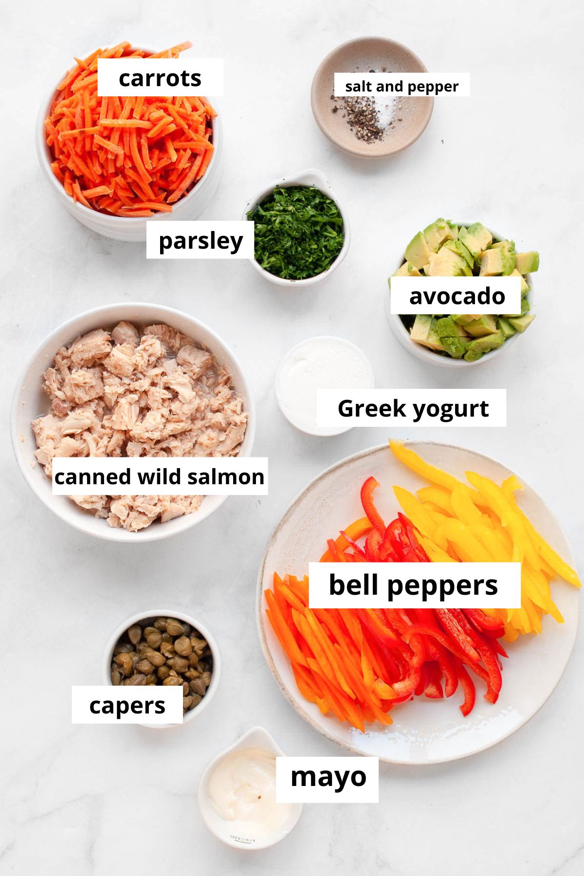 Canned salmon, carrots, bell peppers, parsley, mayo, Greek yogurt, capers, avocado, salt and pepper.