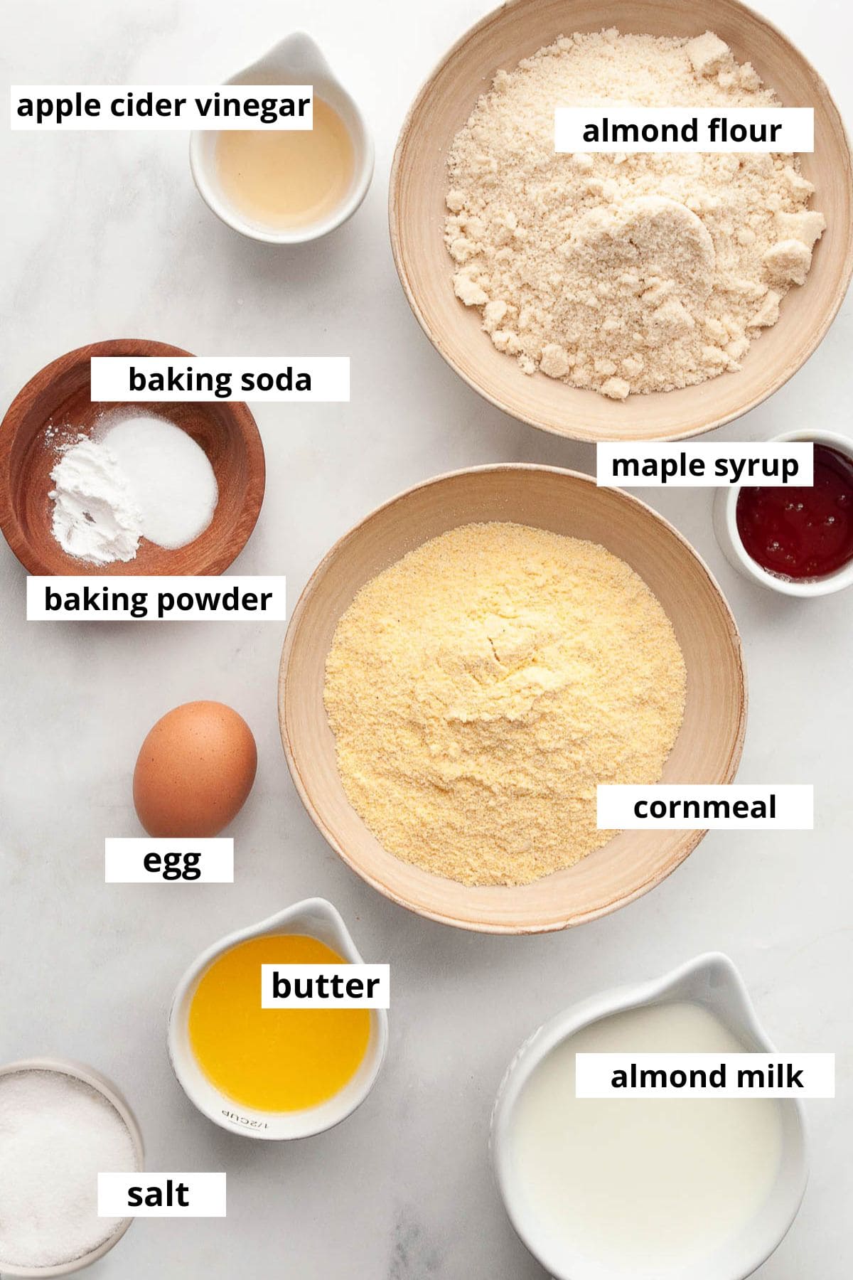 Almond flour, cornmeal, milk, egg, apple cider vinegar, maple syrup, melted butter, baking powder, baking soda, salt.