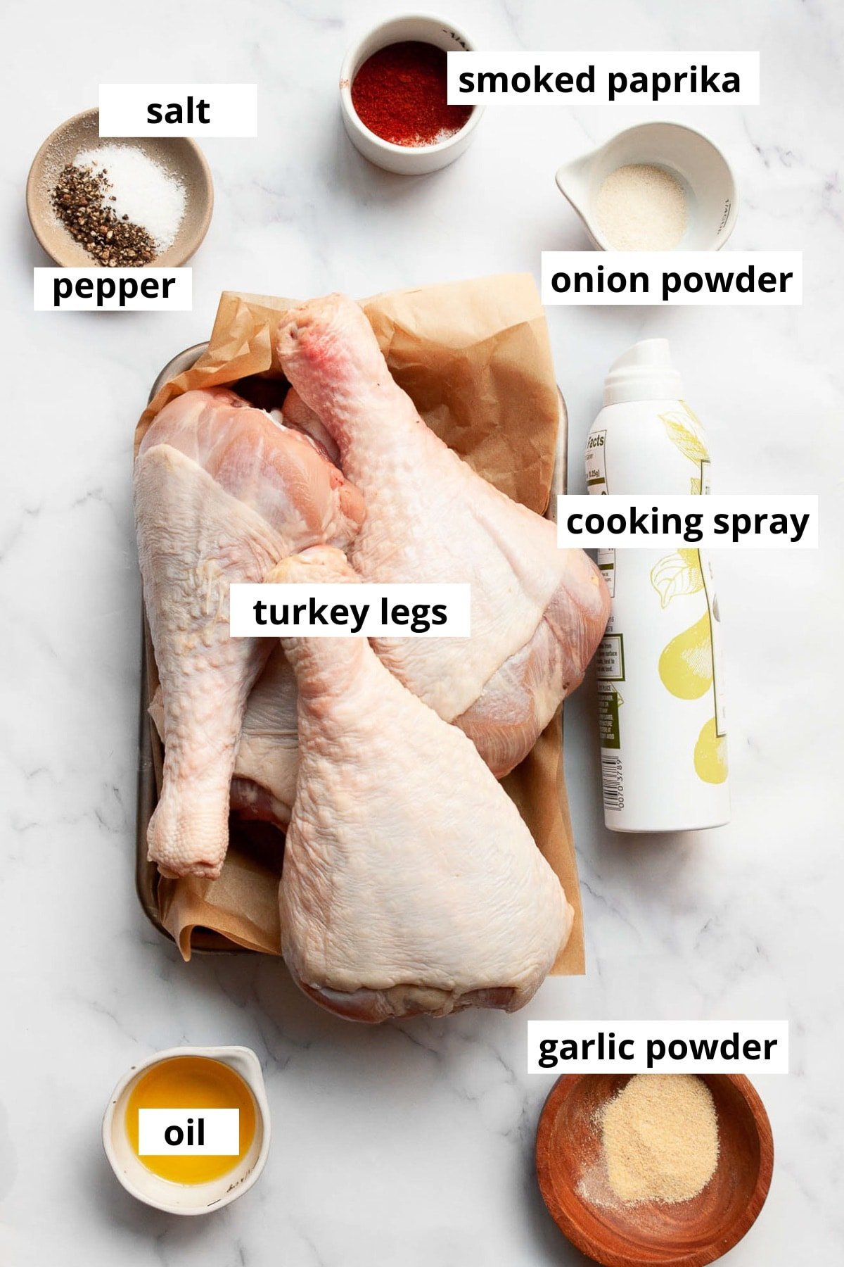 Raw turkey drumsticks, oil, cooking spray, onion powder, garlic powder, smoked paprika, salt and pepper.