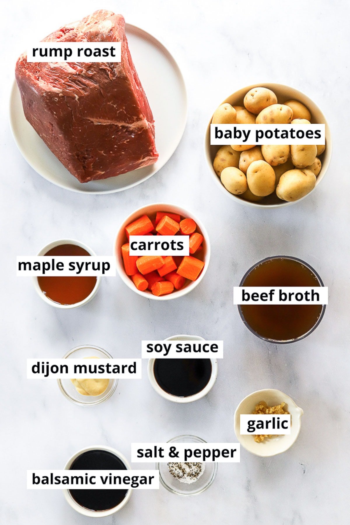 Rump roast, baby potatoes, carrots, maple syrup, beef broth, soy sauce, dijon mustard, balsamic vinegar, garlic, salt and pepper.