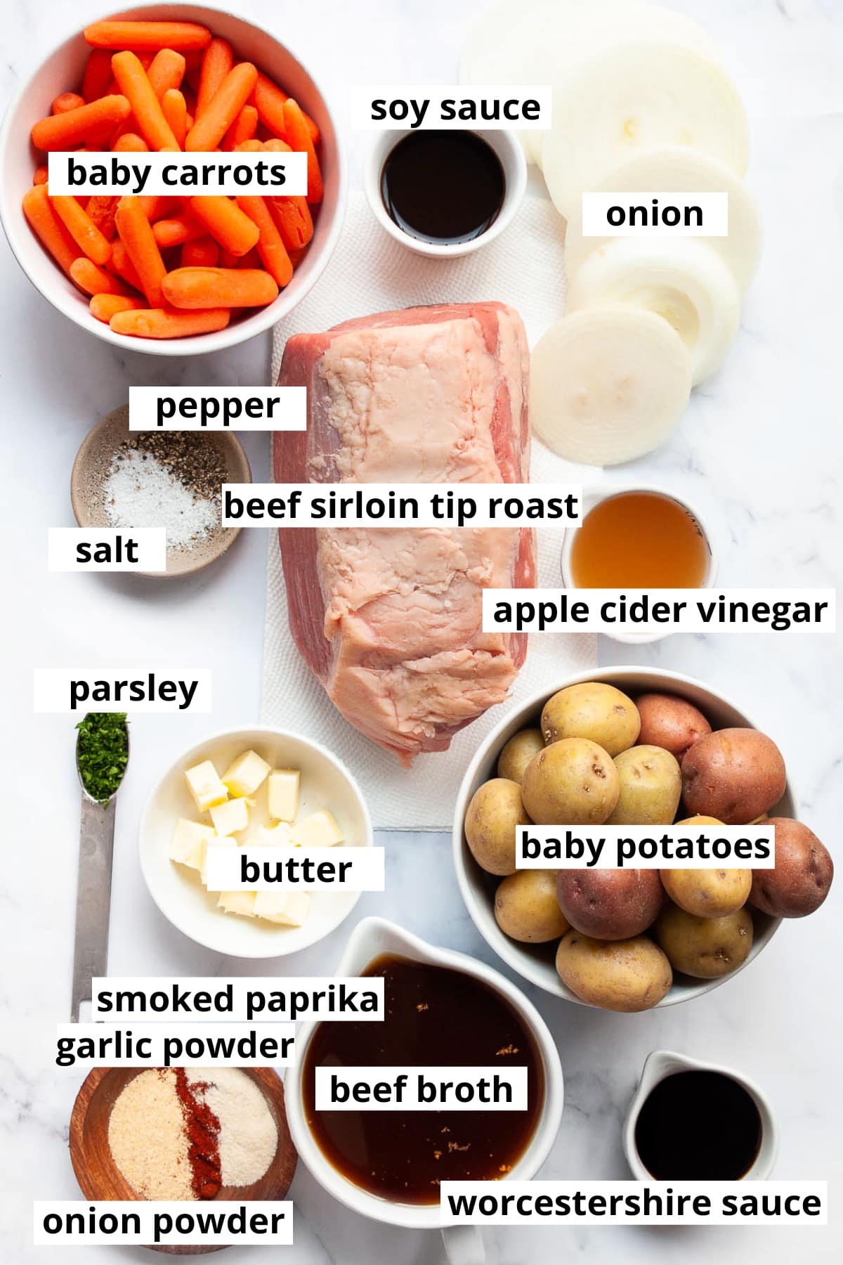 Beef sirloin tip roast, baby potatoes, baby carrots, onion, soy sauce, apple cider vinegar, butter, beef broth, worcestershire, onion powder, garlic powder, smoked paprika, dried parsley, salt, pepper.