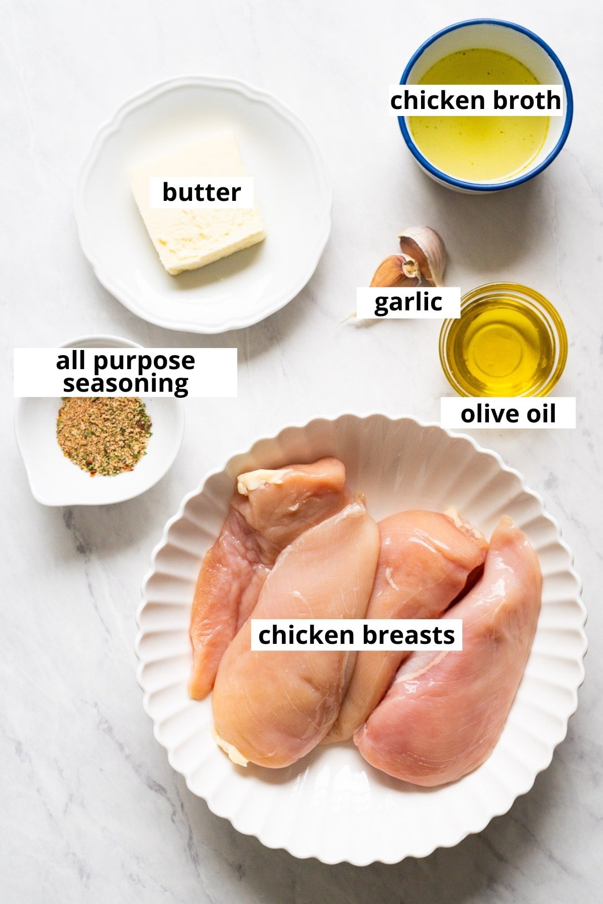 Chicken breasts, all purpose seasoning, olive oil, garlic cloves, butter, chicken broth.