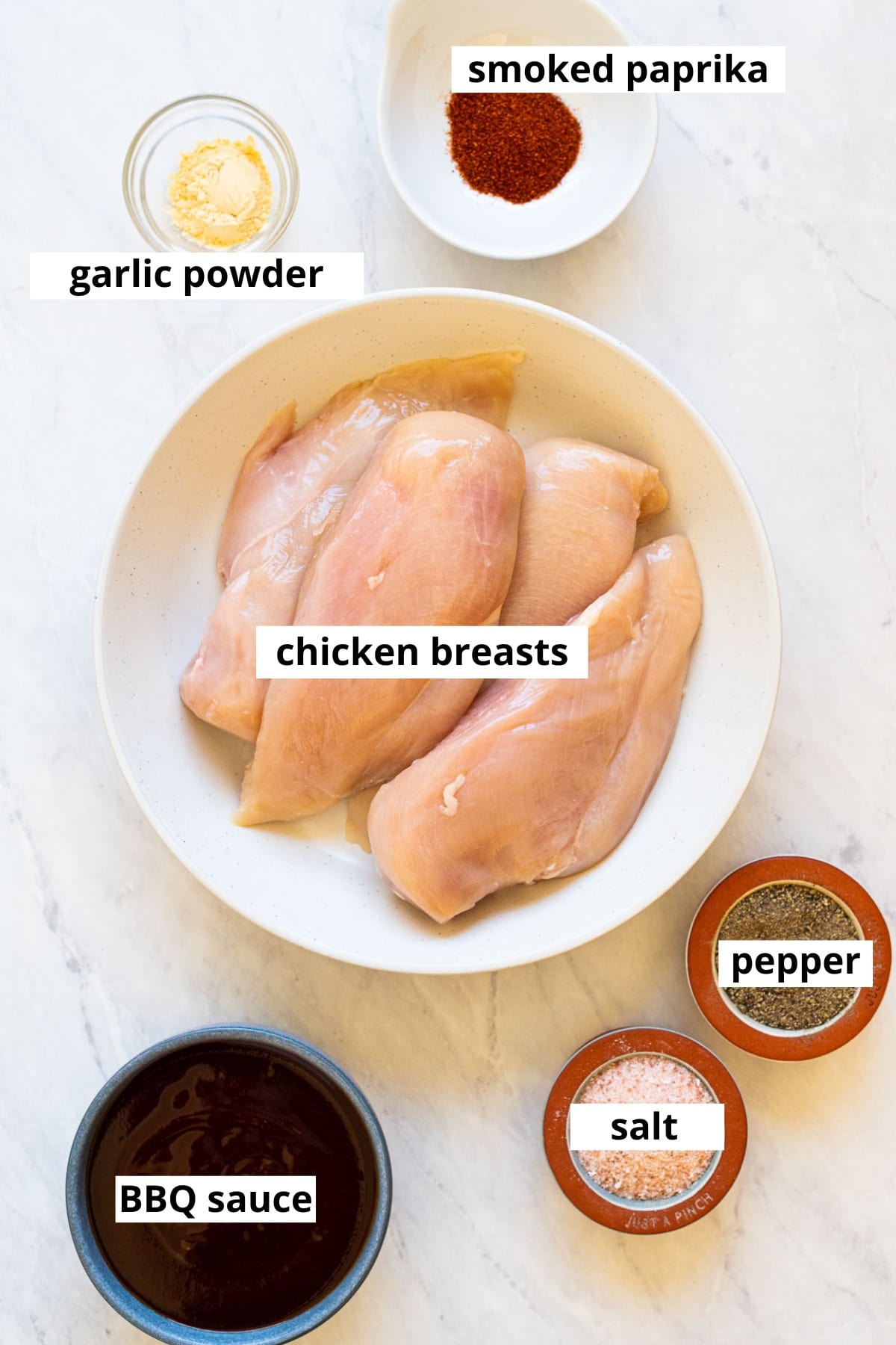 Boneless skinless chicken breasts, BBQ sauce, salt, pepper, smoked paprika and garlic powder.