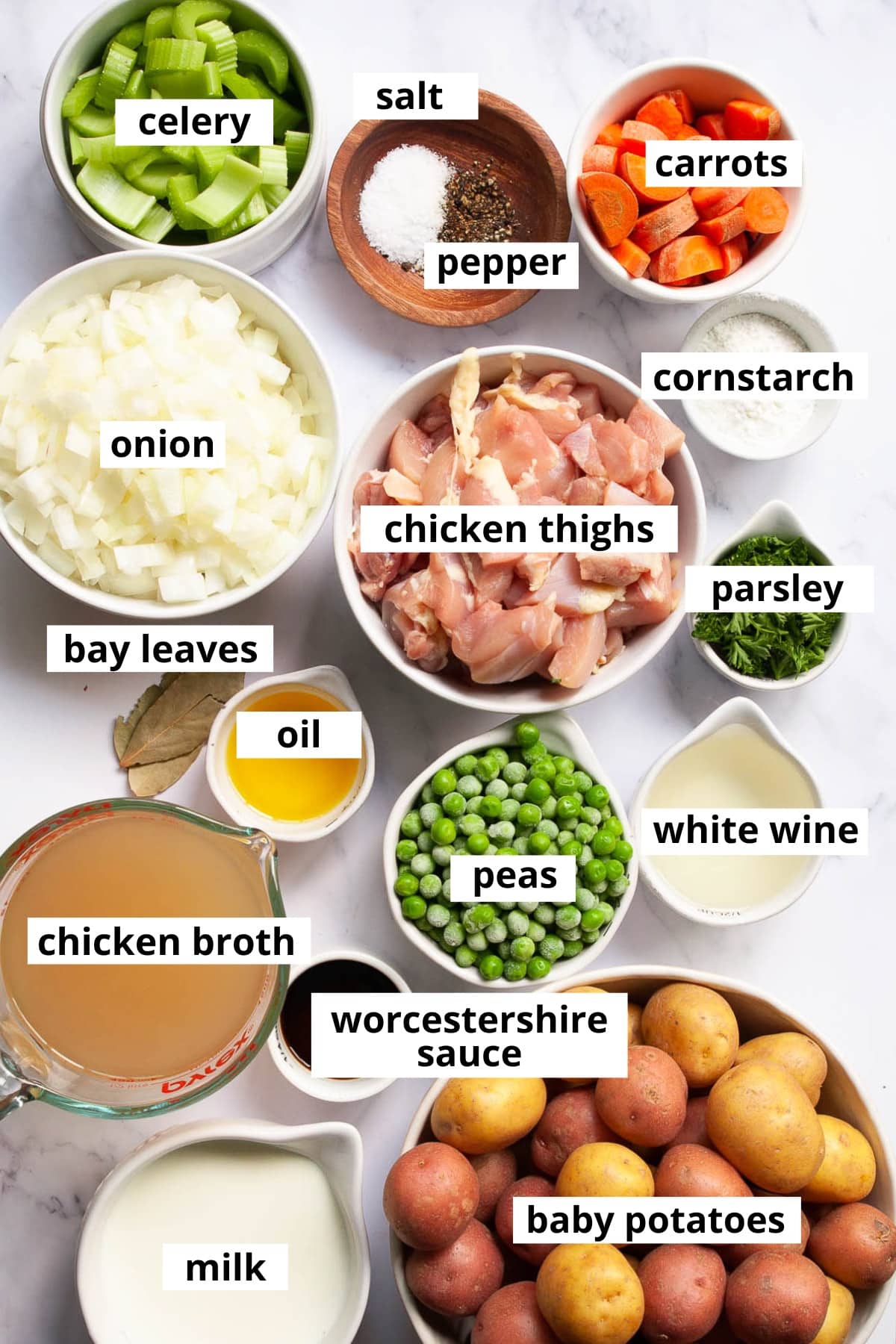 Chicken thighs, onion, celery, carrots, salt, pepper, cornstarch, parsley, bay leaves, oil, peas, white wine, chicken broth, Worcestershire, baby potatoes, milk.