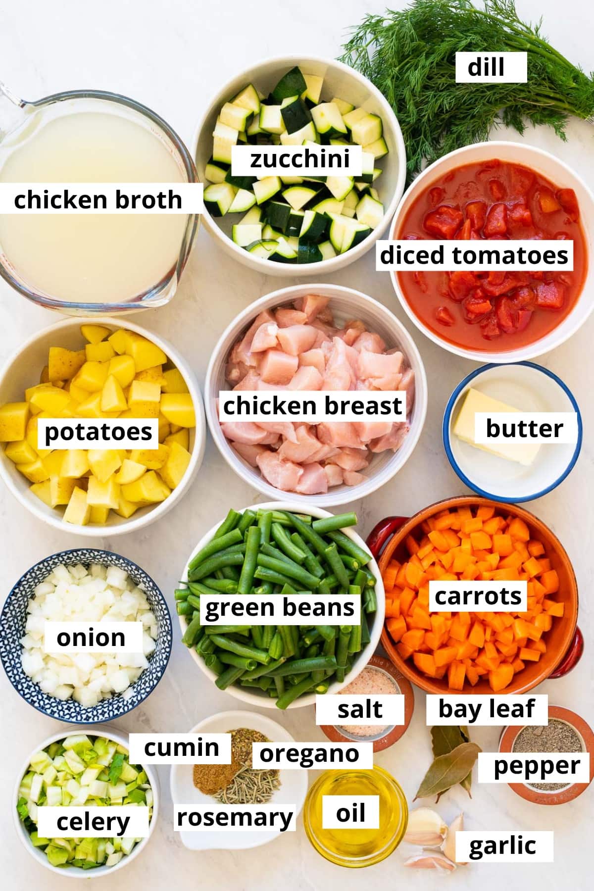 Diced tomatoes, zucchini, potatoes, chicken breast chicken broth, Dill, butter, onion, green beans, carrots, celery, spices, bay leaf, oil and garlic.