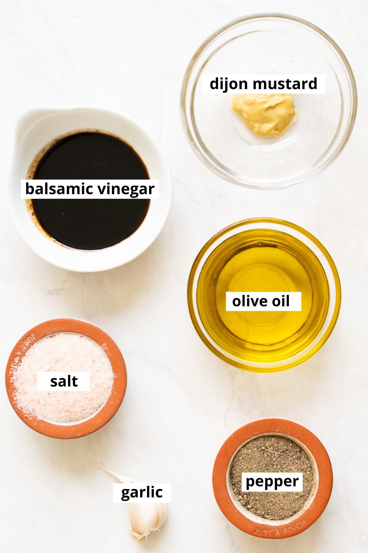 Olive oil, balsamic vinegar, Dijon mustard, garlic, salt and pepper.