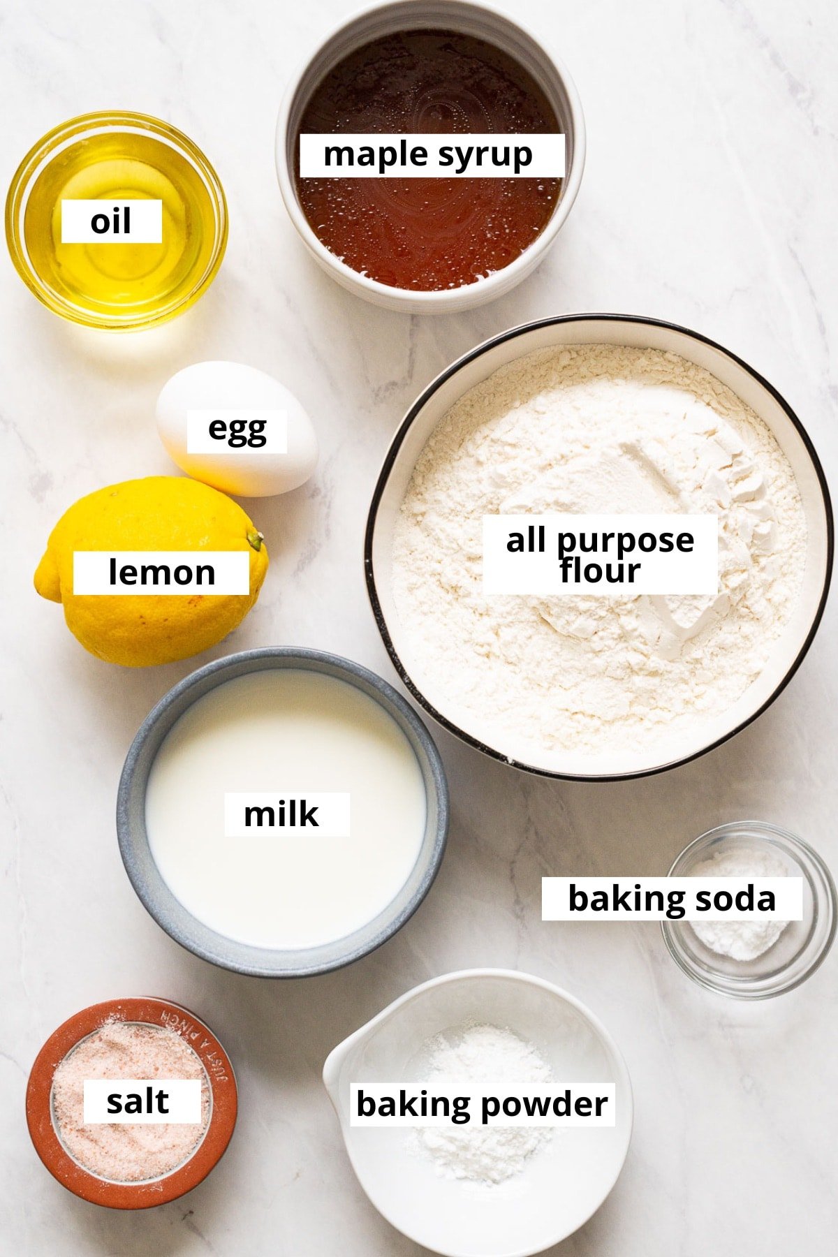 Maple syrup, oil, egg, lemon, flour, milk, salt, baking soda, baking powder.