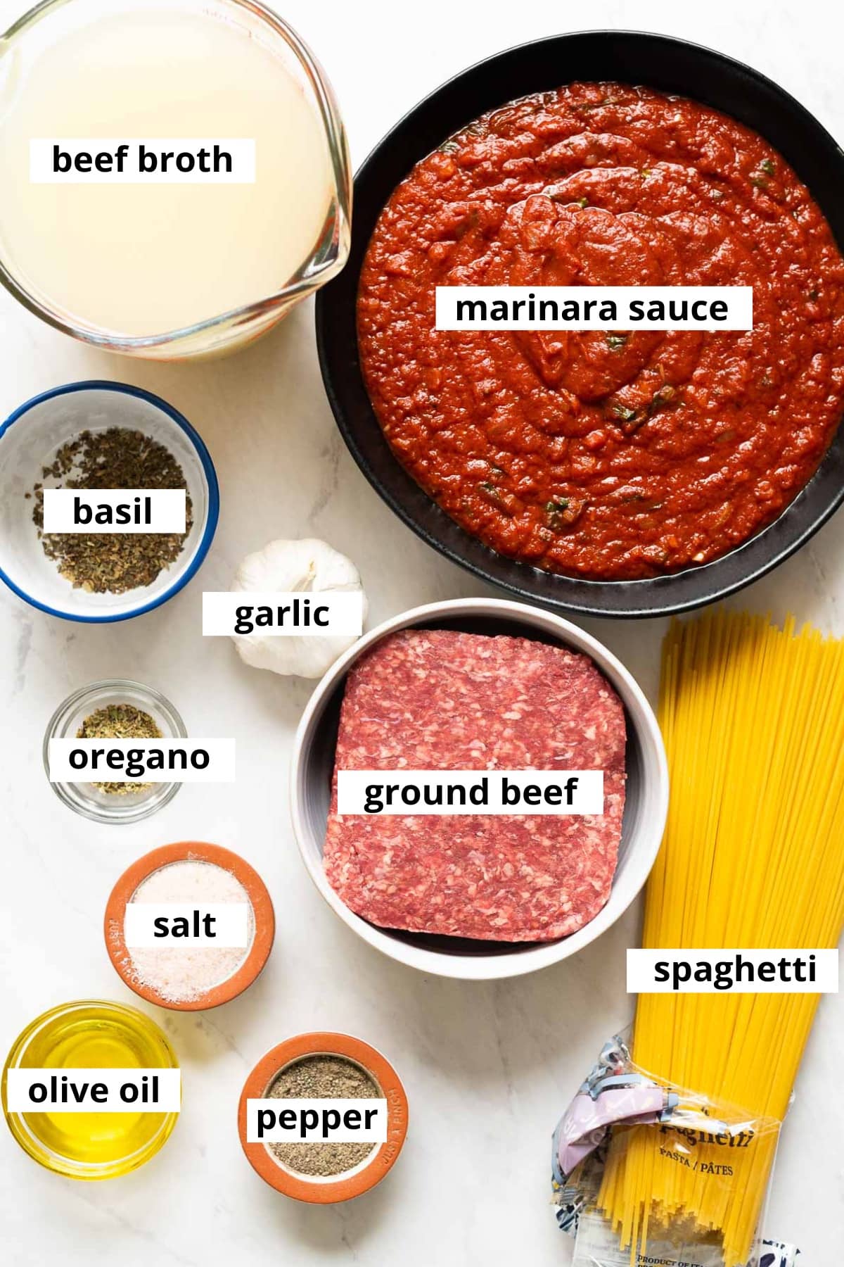 Ground beef, spaghetti, marinara sauce, oil, salt, pepper, basil, oregano, garlic, broth.