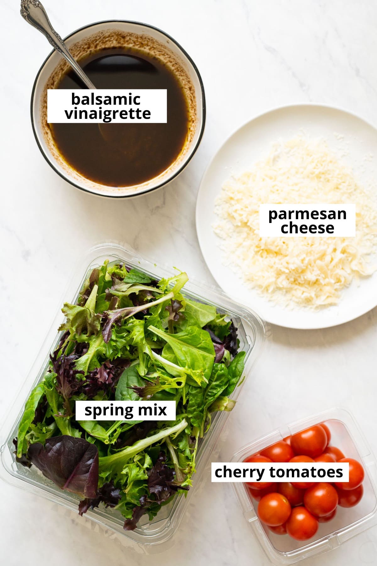 Balsamic vinaigrette, parmesan cheese, spring mix, cherry tomatoes.