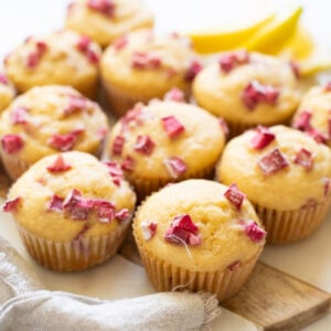 Rhubarb muffins on a serving plate.