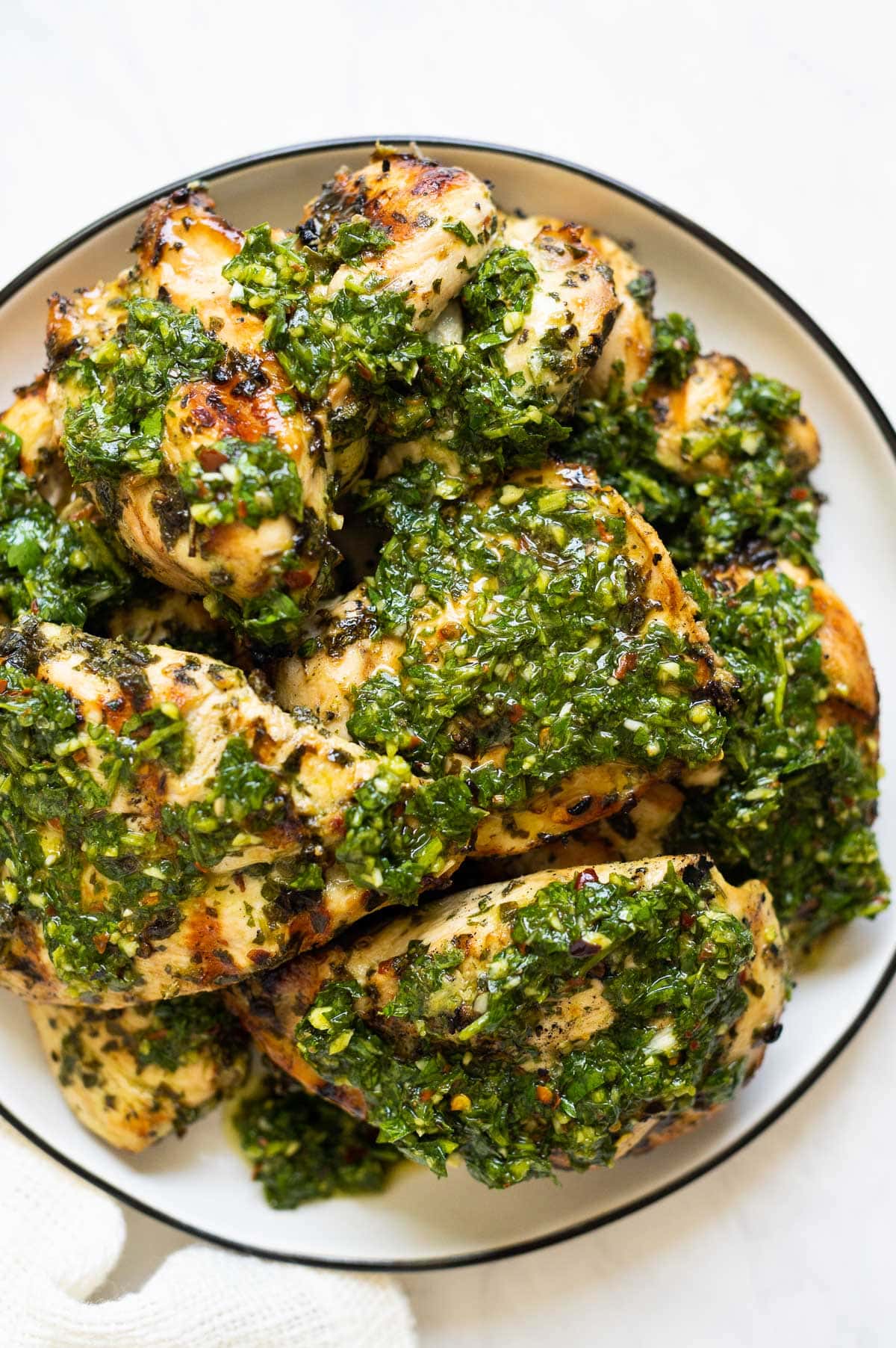 Chimichurri chicken on a plate.
