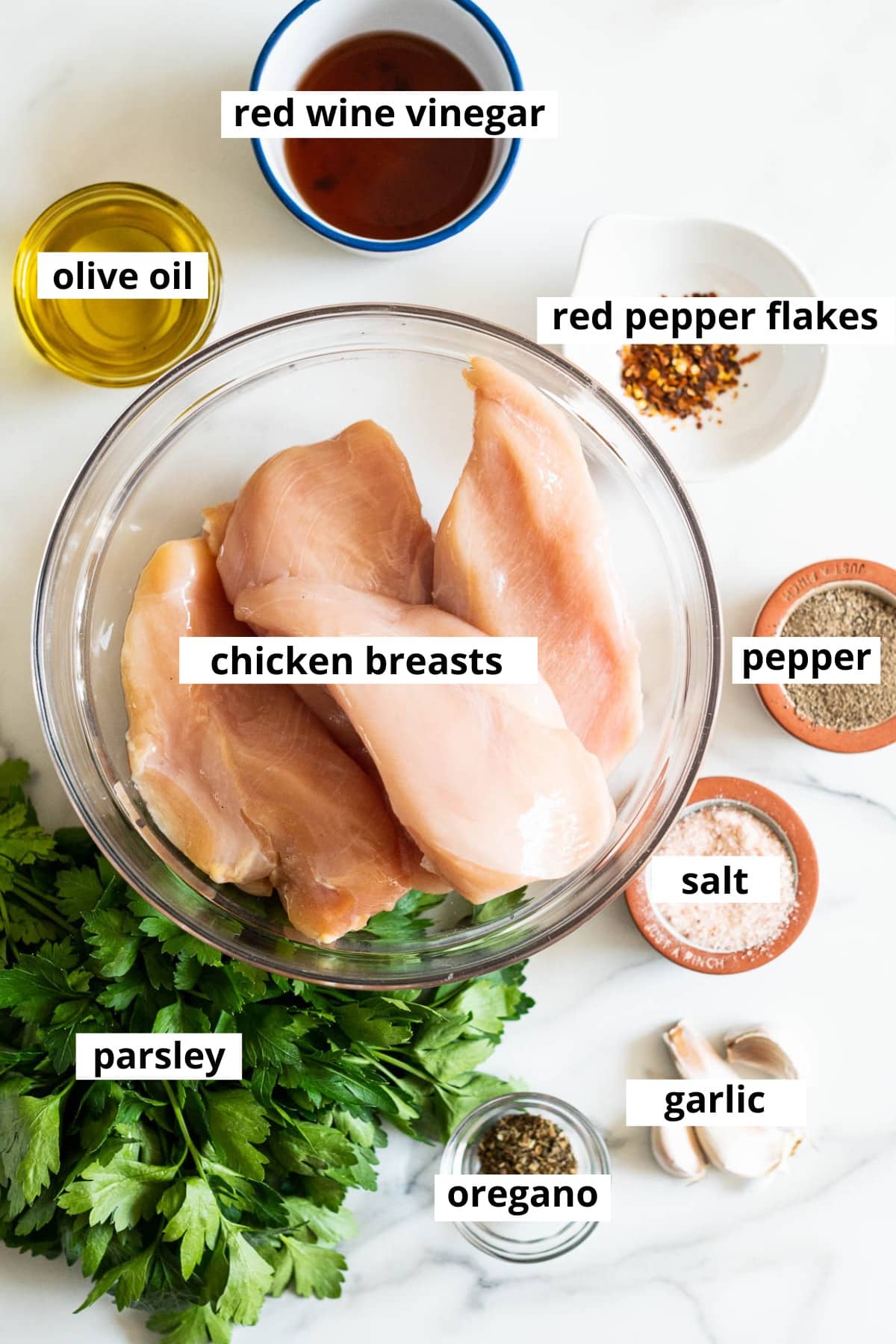 Chicken breasts, parsley, garlic, dried oregano, red pepper flakes, red wine vinegar, olive oil, salt and pepper.
