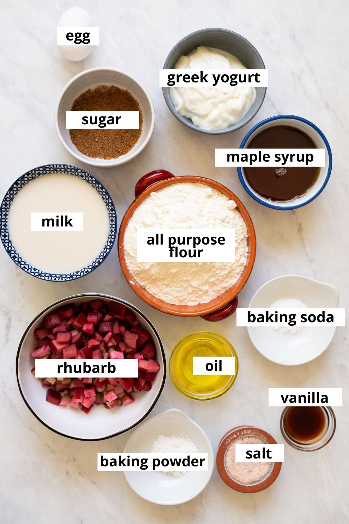 Rhubarb, egg, milk, Greek yogurt, all purpose flour, maple syrup, sugar, baking soda, baking powder, oil, vanilla, salt.
