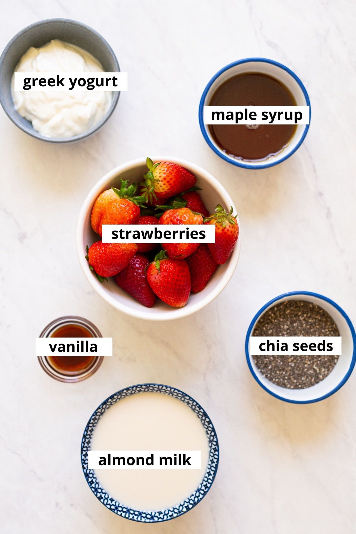 Greek yogurt, fresh strawberries, maple syrup, vanilla extract, chia seeds, almond milk.