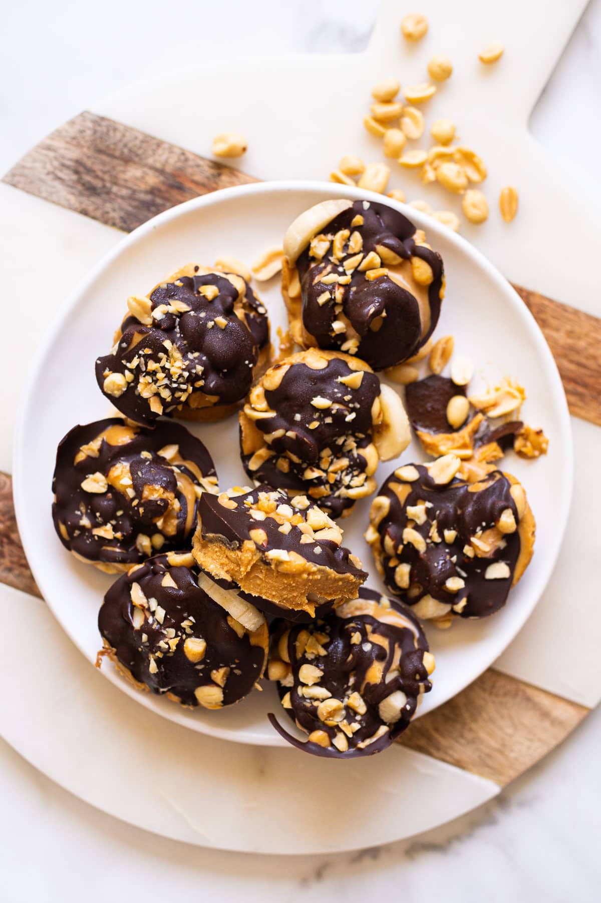 Frozen banana Snickers on a platter.