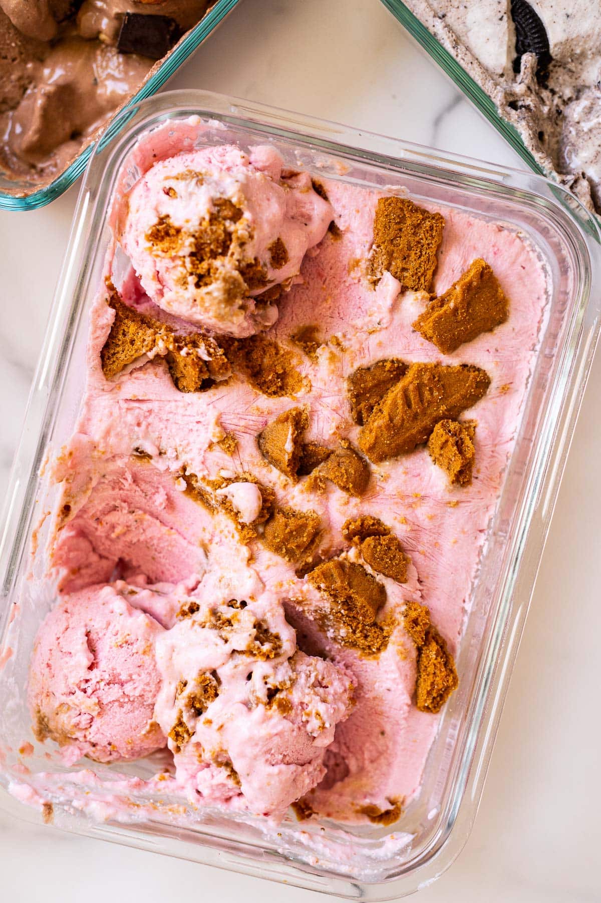 Strawberry cottage cheese ice cream in glass container.