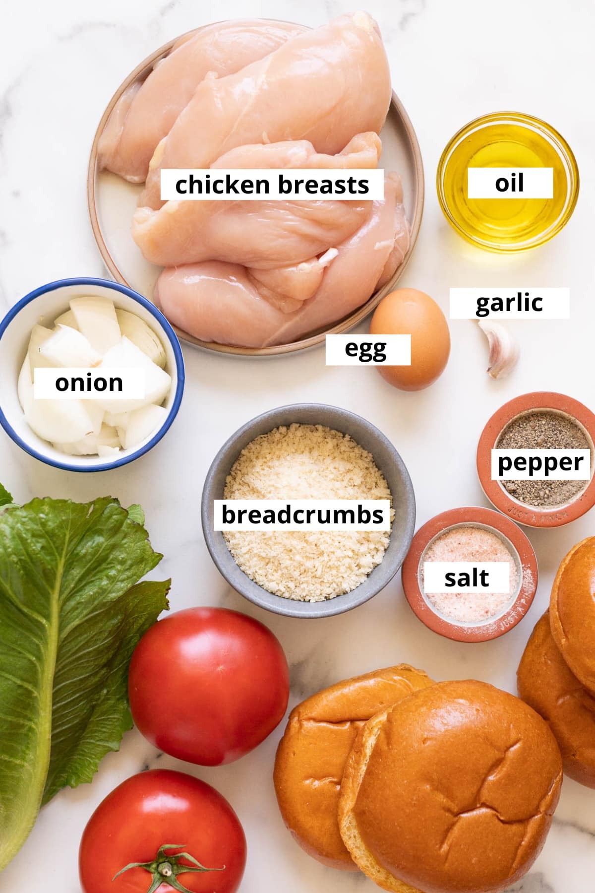 Chicken breasts, egg, garlic, onion, bread crumbs, salt and pepper.
