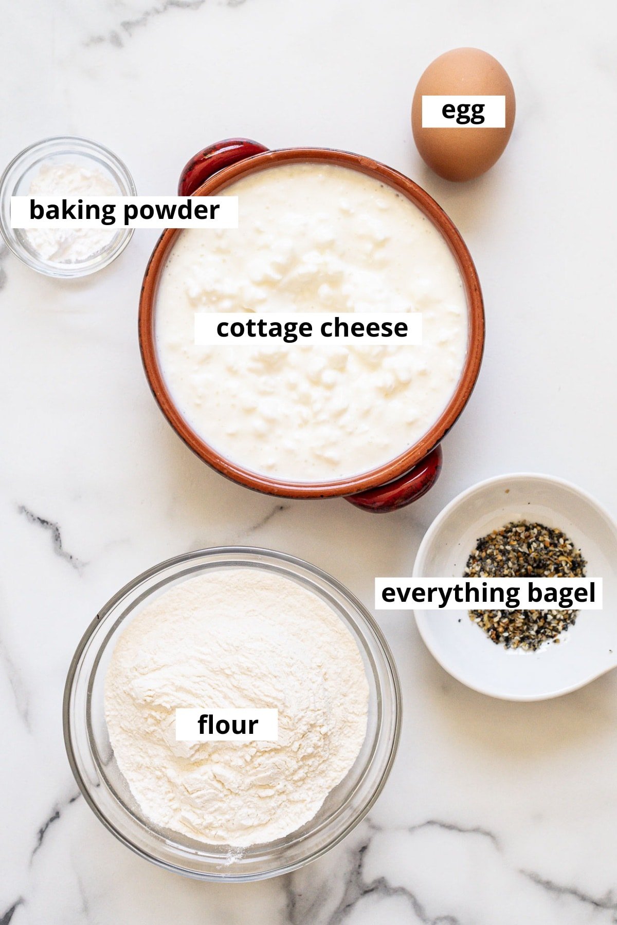 Cottage cheese, egg, baking powder, flour, everything bagel seasoning.