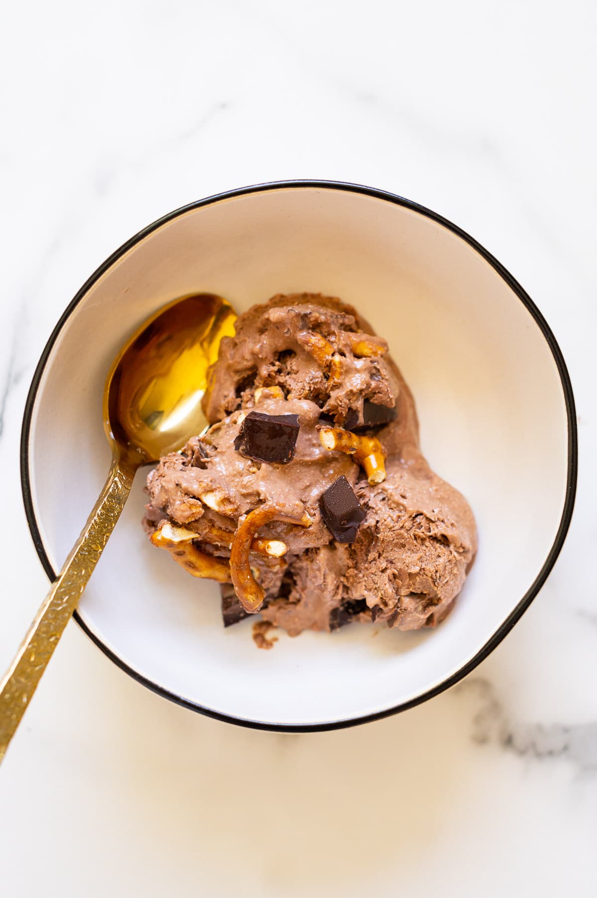 Peanut butter chocolate cottage cheese ice cream in a bowl.