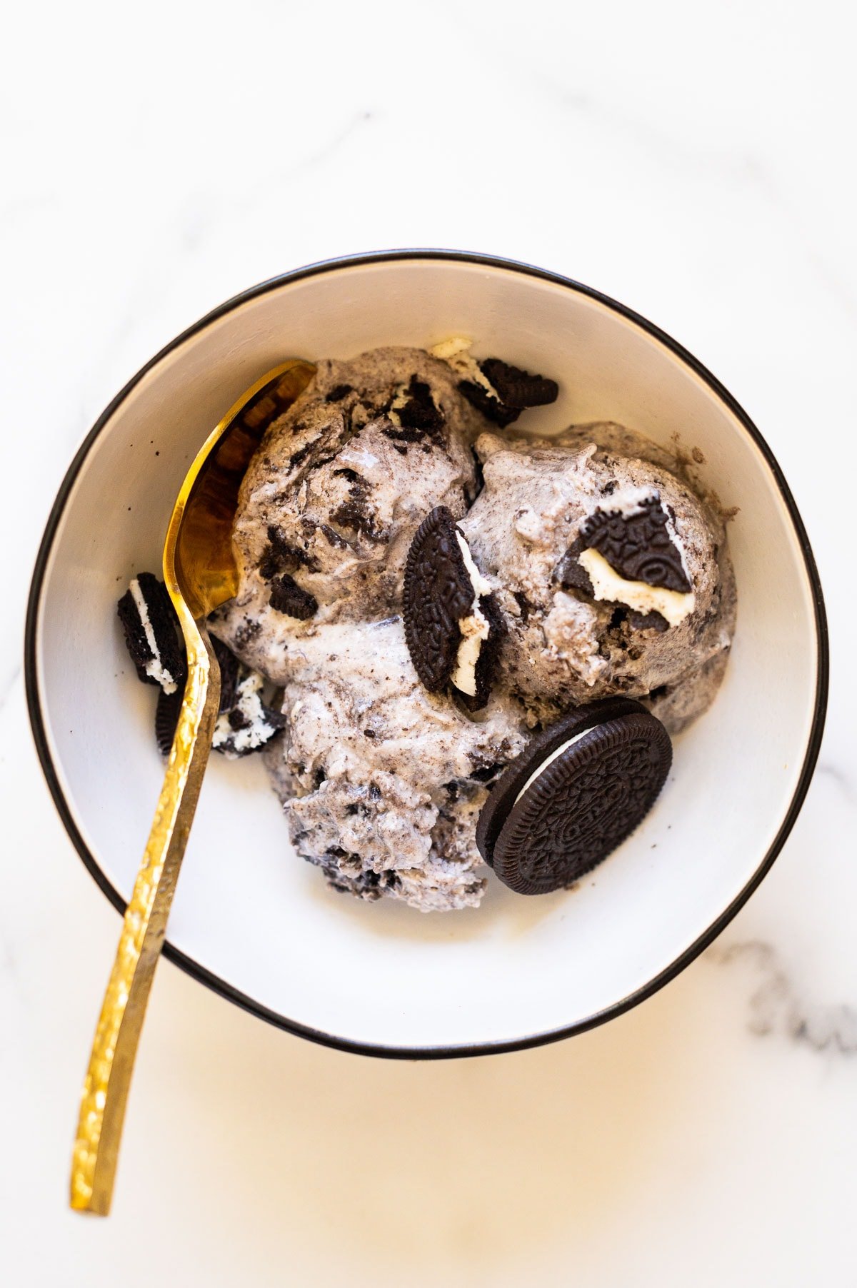 Cookies and cream cottage cheese ice cream served with cookies in a bowl.