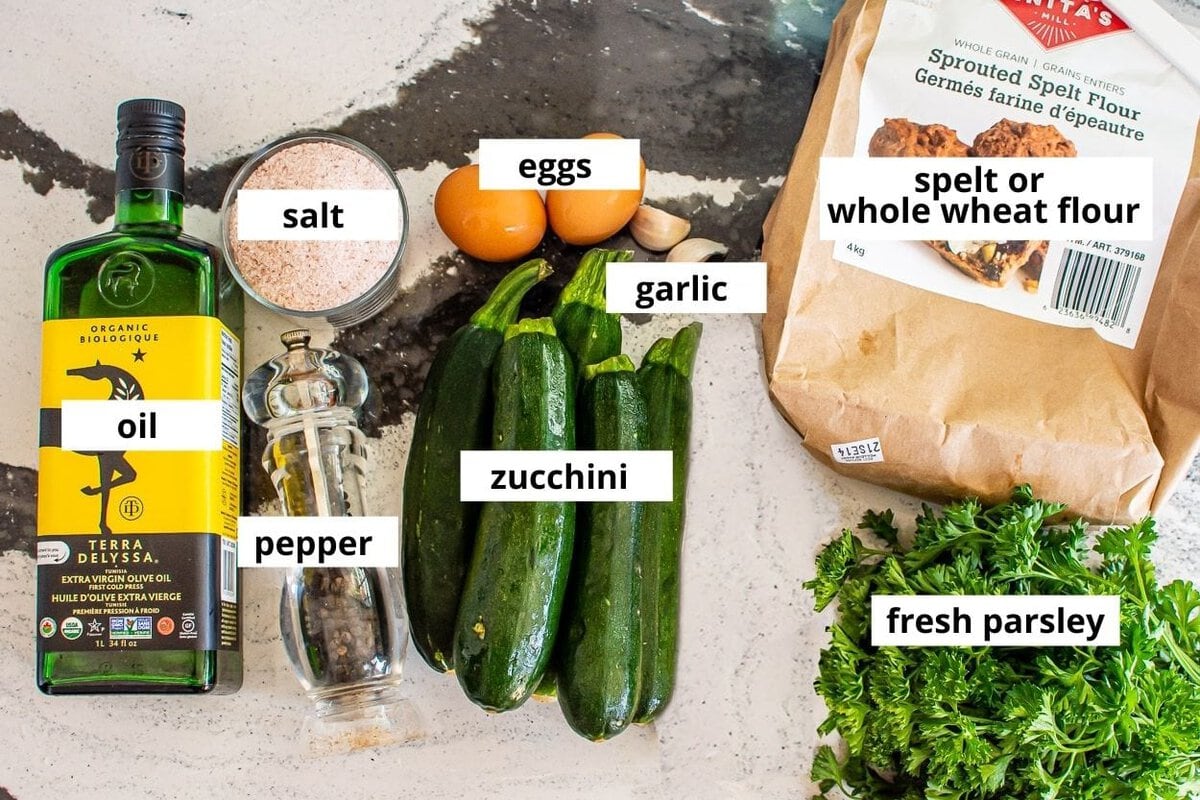 Zucchini, eggs, garlic, parsley, flour, oil, salt and pepper.