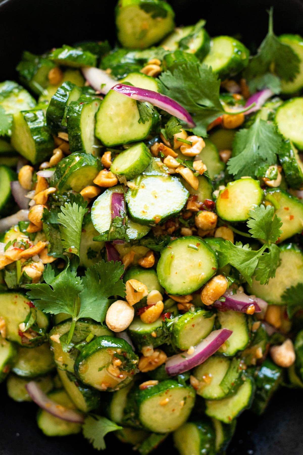 Close up of Thai cucumber salad recipe with peanuts.