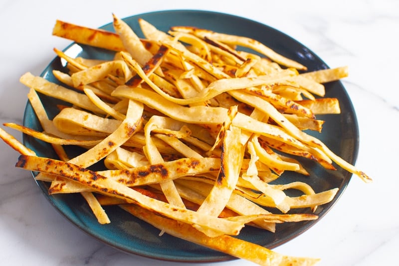 Tortilla strips on a plate.