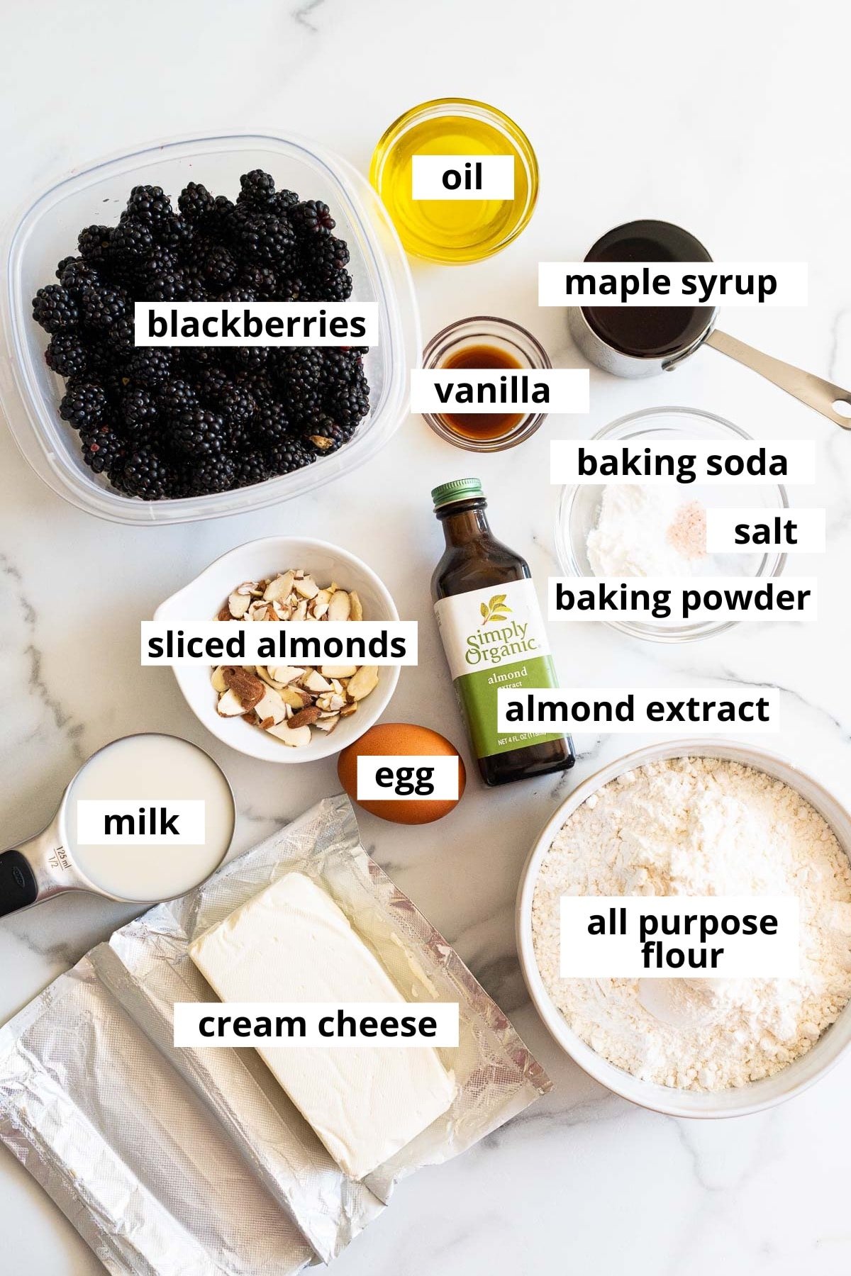 Blackberries, oil, vanilla, maple syrup, baking soda, salt, baking powder, almond extract, sliced almonds, egg, milk, all-purpose flour, cream cheese.
