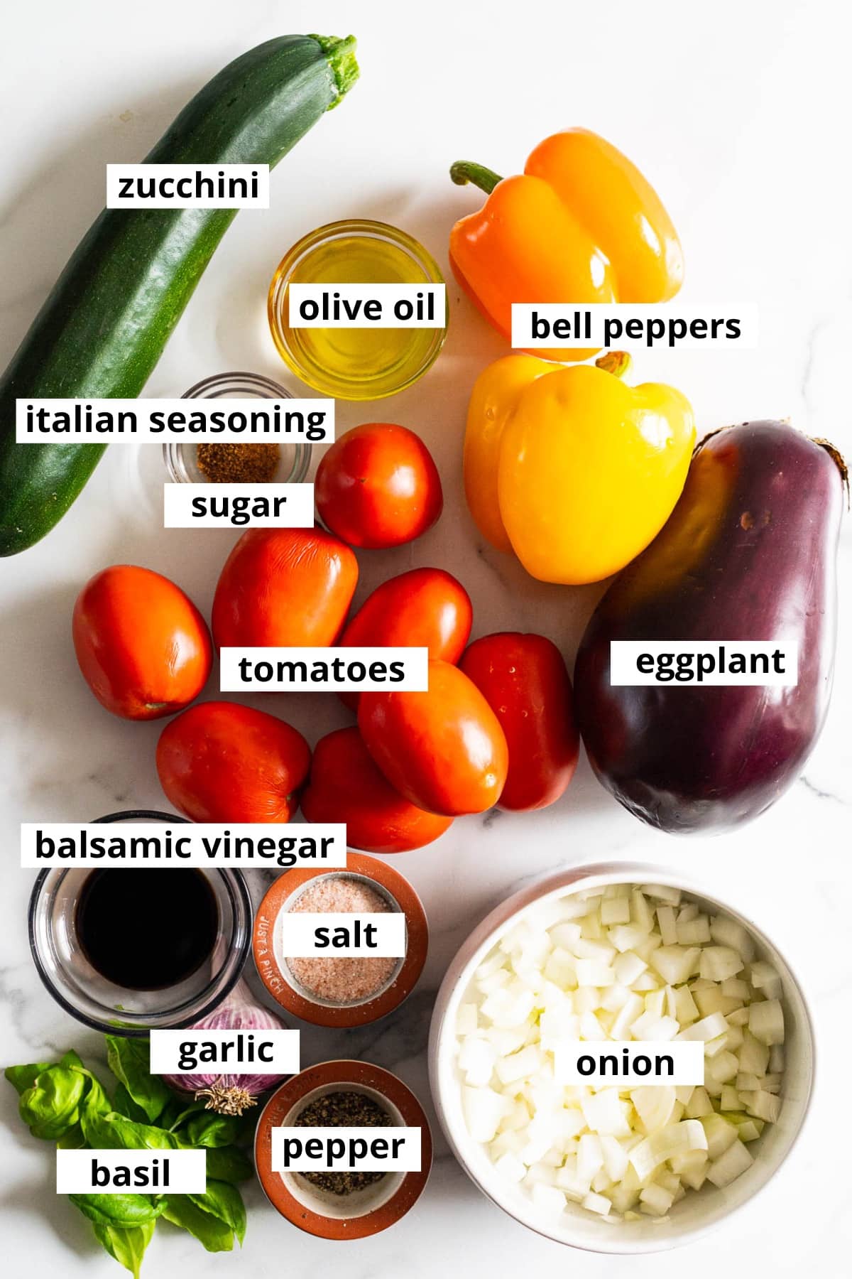 Eggplant, bell peppers, tomatoes, zucchini, olive oil, Italian seasoning, sugar, balsamic vinegar, onion, basil, garlic, salt and pepper.