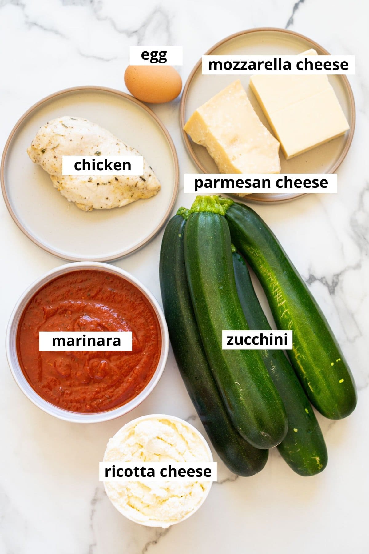 Zucchini, chicken breast, parmesan cheese, mozzarella cheese, egg, marinara sauce, ricotta cheese.