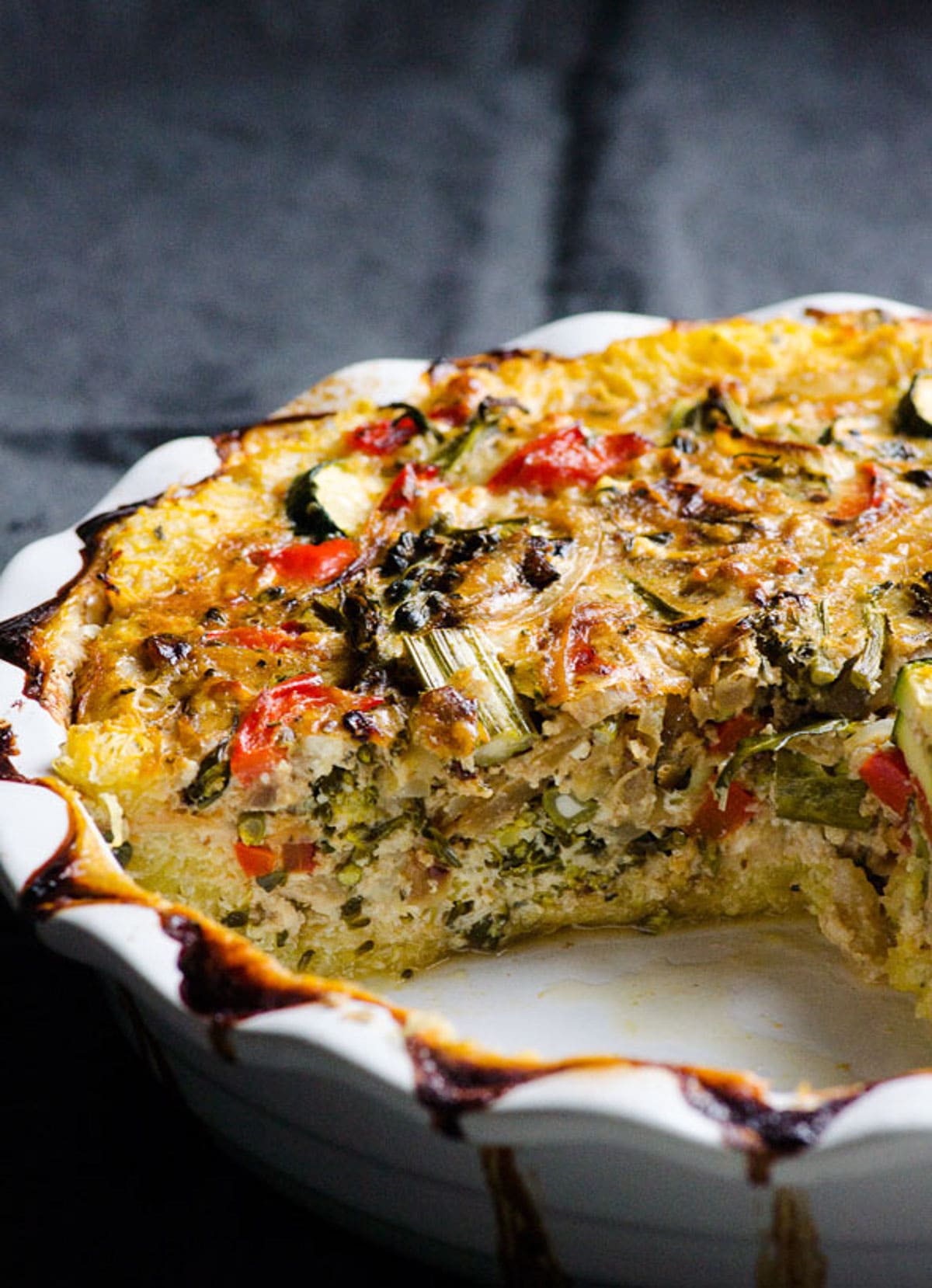 Spaghetti squash quiche sliced and showing texture inside.