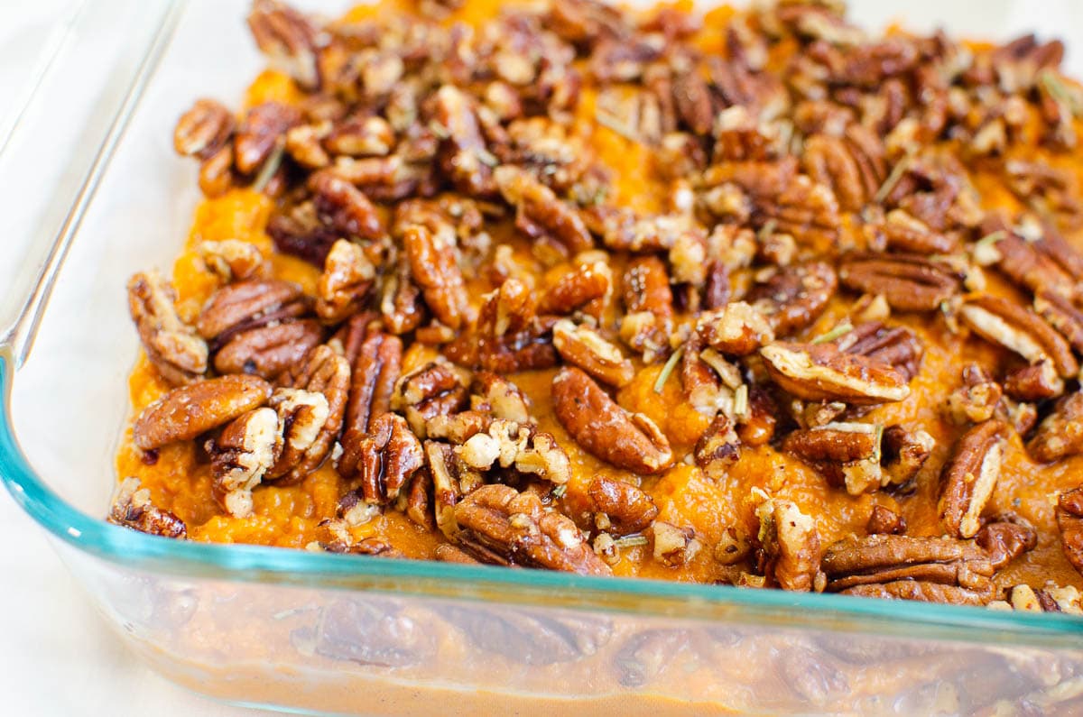 Side view of instant pot sweet potato casserole in a baking dish.