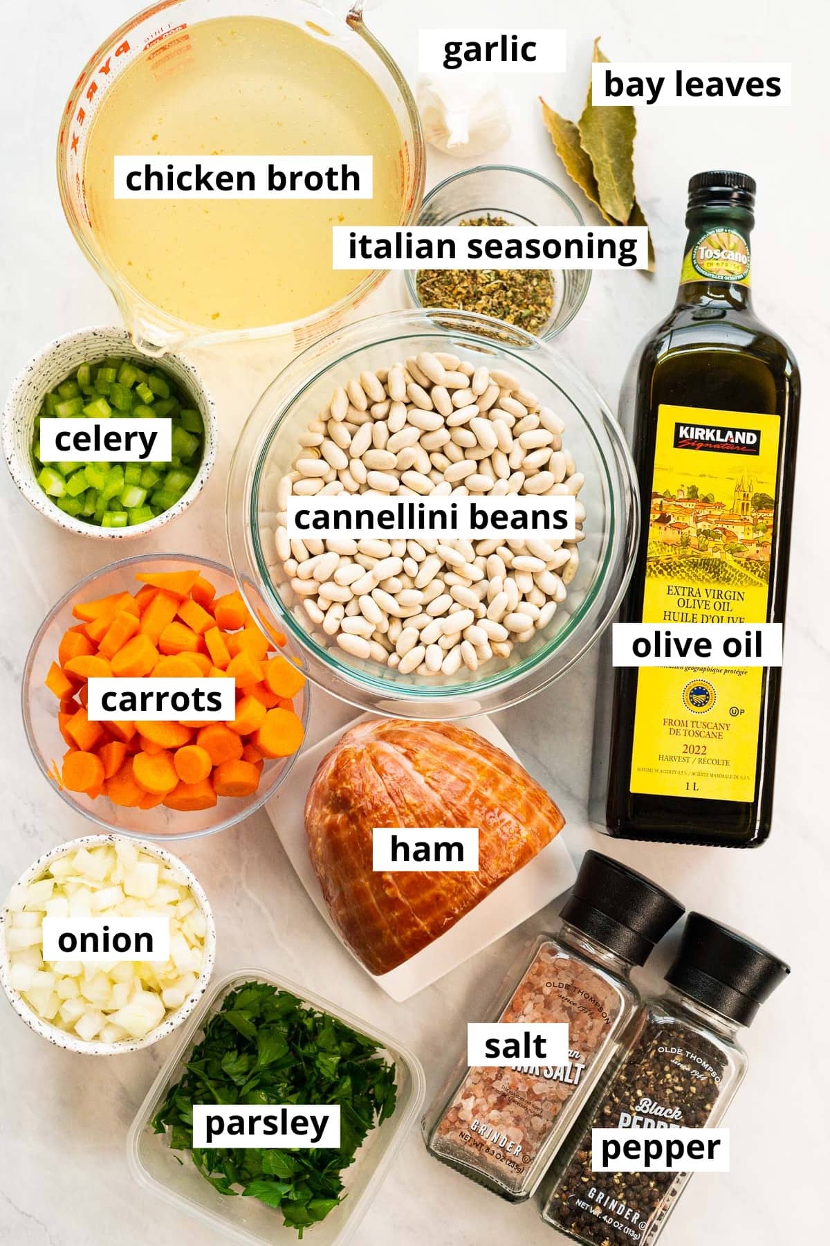 Cannellini beans, onion, celery, carrots, ham, garlic, chicken broth, Italian seasoning, bay leaves, olive oil, parsley, salt and pepper.