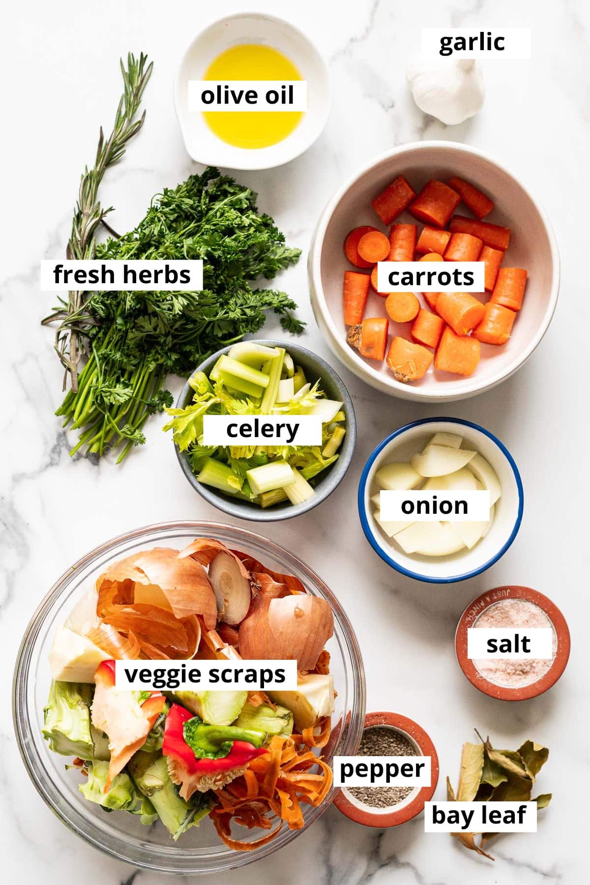Carrots, celery, onion, parsley, Rosemary, garlic, olive oil, veggie scraps, bay leaf, salt and pepper.