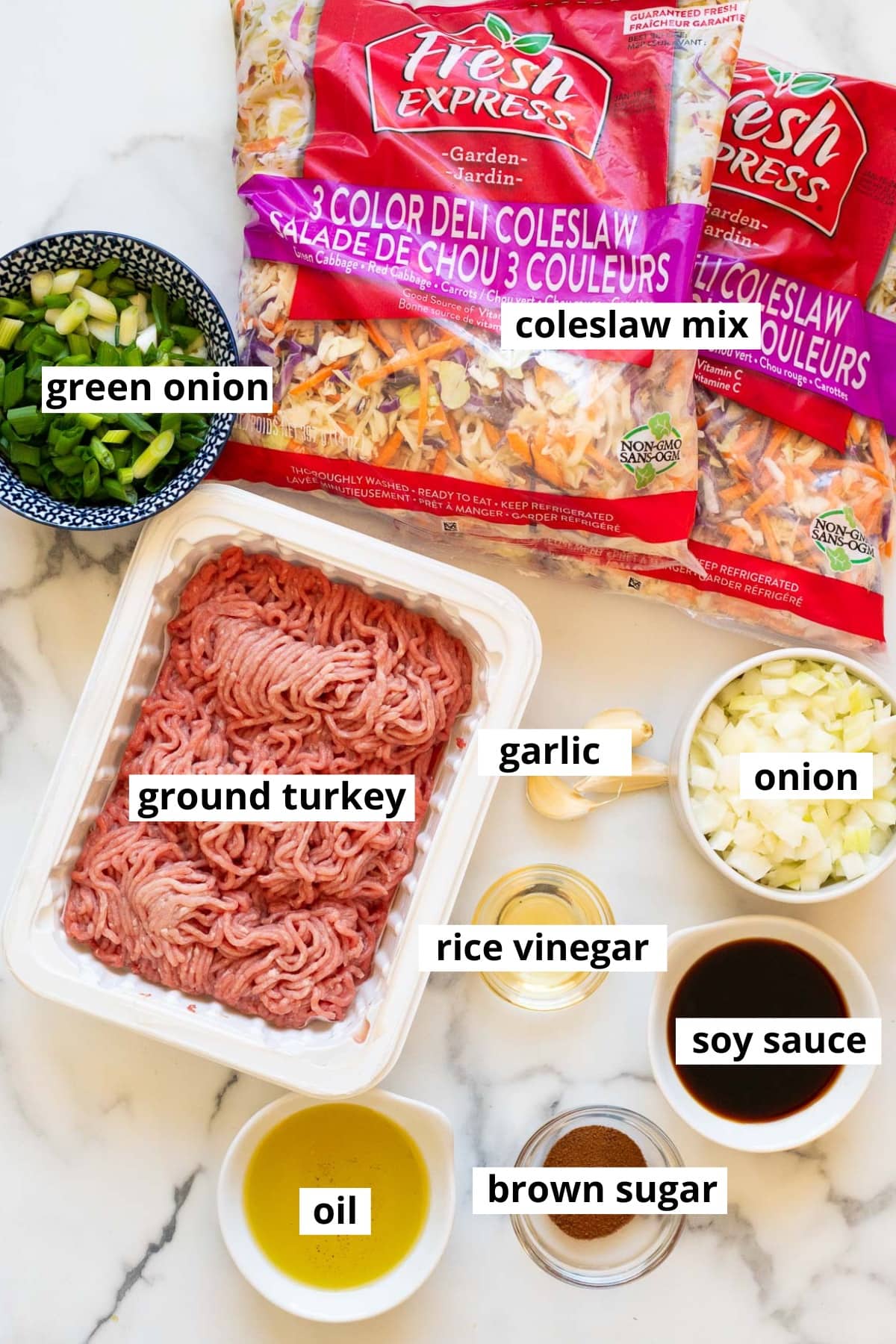 Coleslaw mix, green onion, ground turkey, garlic, onion, rice vinegar, soy sauce, brown sugar, oil.
