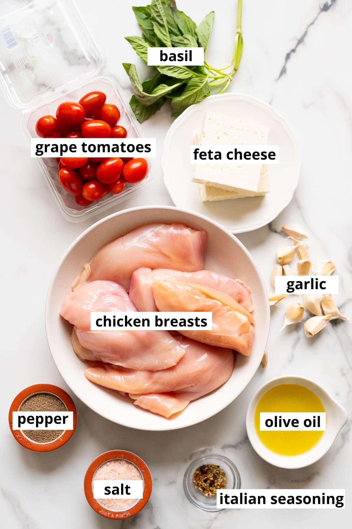 Chicken breasts, feta cheese, garlic, grape tomatoes, salt, pepper, olive oil, basil, italian seasoning.