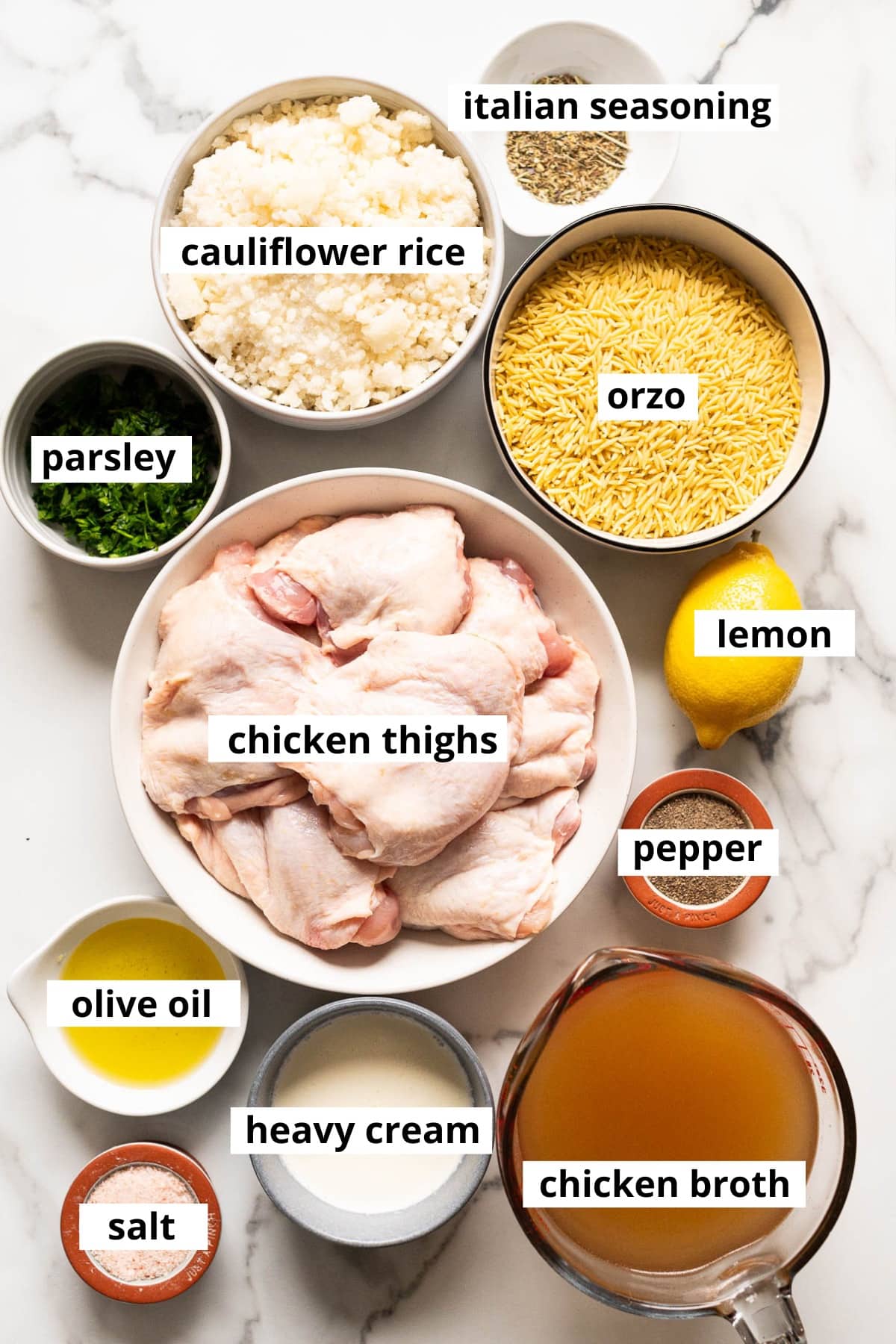 Orzo pasta, chicken thighs, cauliflower rice, Italian seasoning, parsley, lemon, salt, pepper, chicken broth, heavy cream, olive oil.