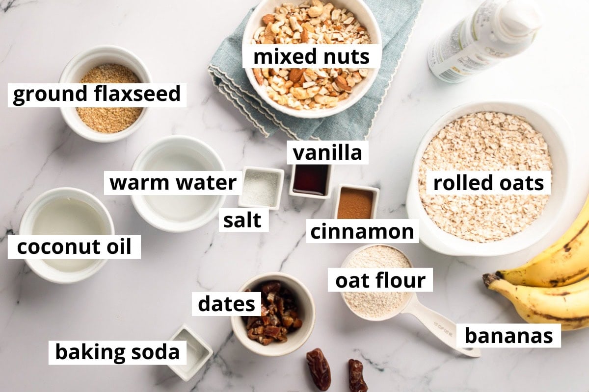 Oats, oat flour, nuts, flaxseed, bananas, dates, coconut oil, vanilla extract, cinnamon, salt, baking soda, warm water, cooking spray.