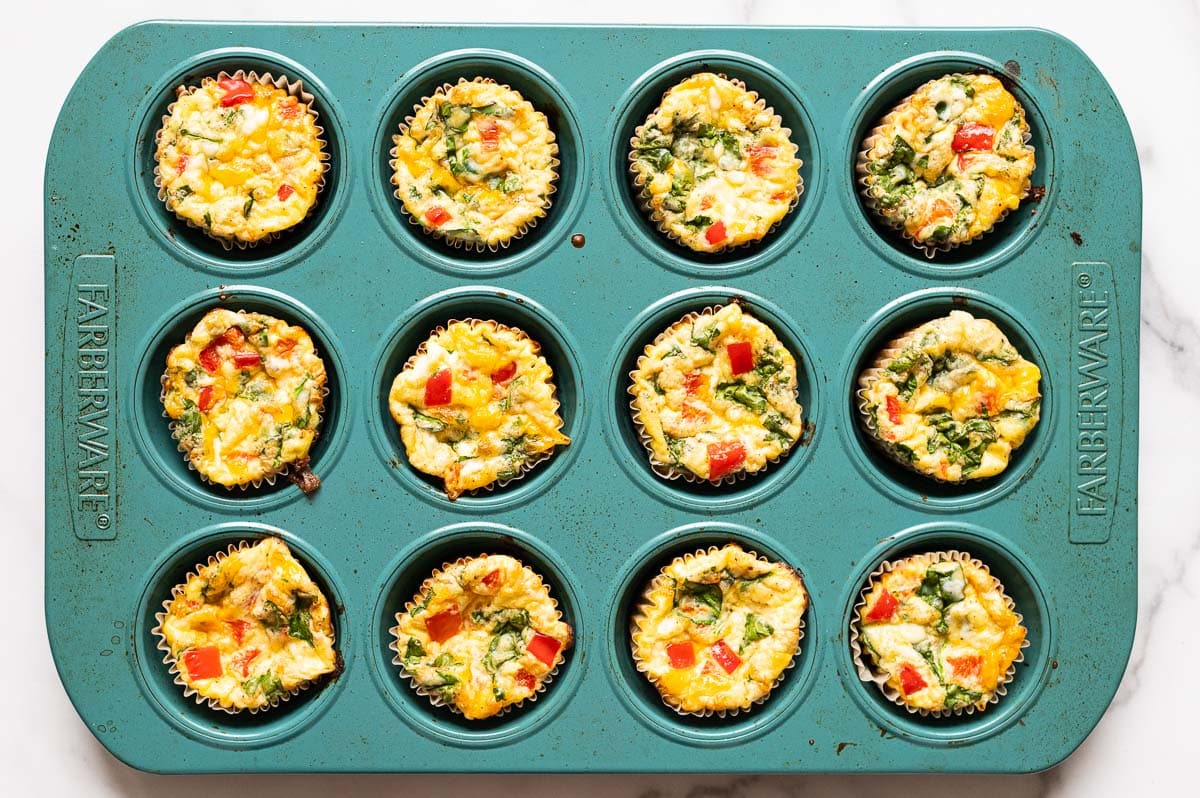 Baked egg muffins in a muffin tin.