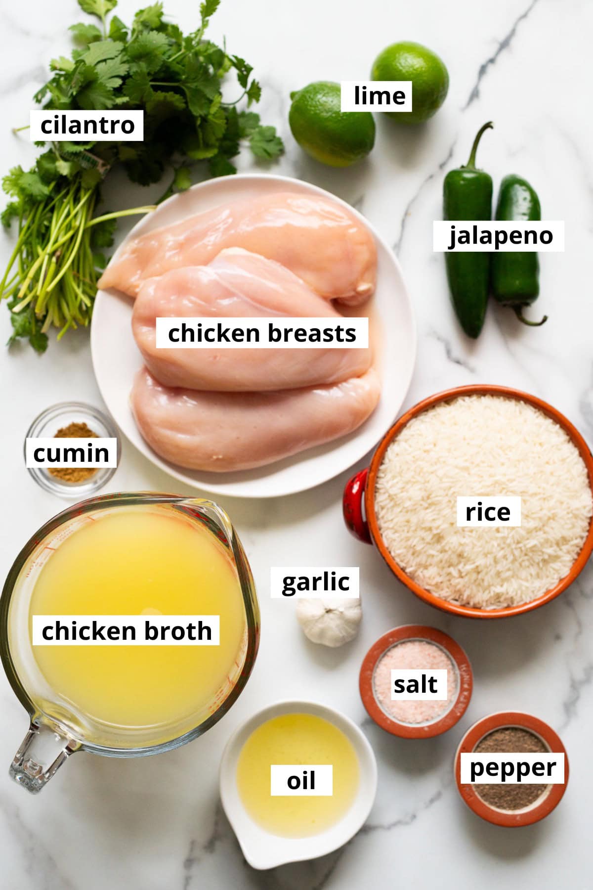 Chicken breasts, rice, garlic, lime, jalapeno, cilantro, cumin, chicken broth, oil, salt and pepper.